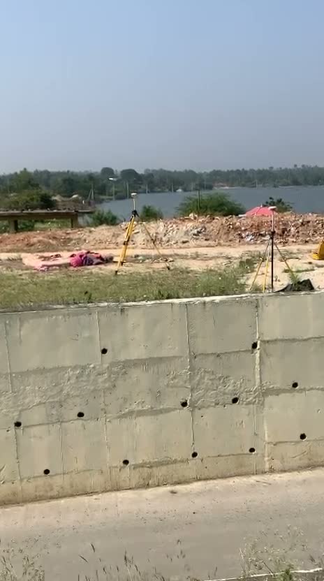 Compound Wall Survey by the Lake